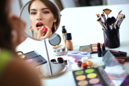 Glam Yourself Up For A Night At The Bingo Woman Applying Lipstick Makeup Table Getting Ready
