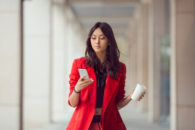 Asian Woman Business Looking Phone Cup