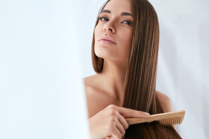 Brunette Woman Long Hair Combing