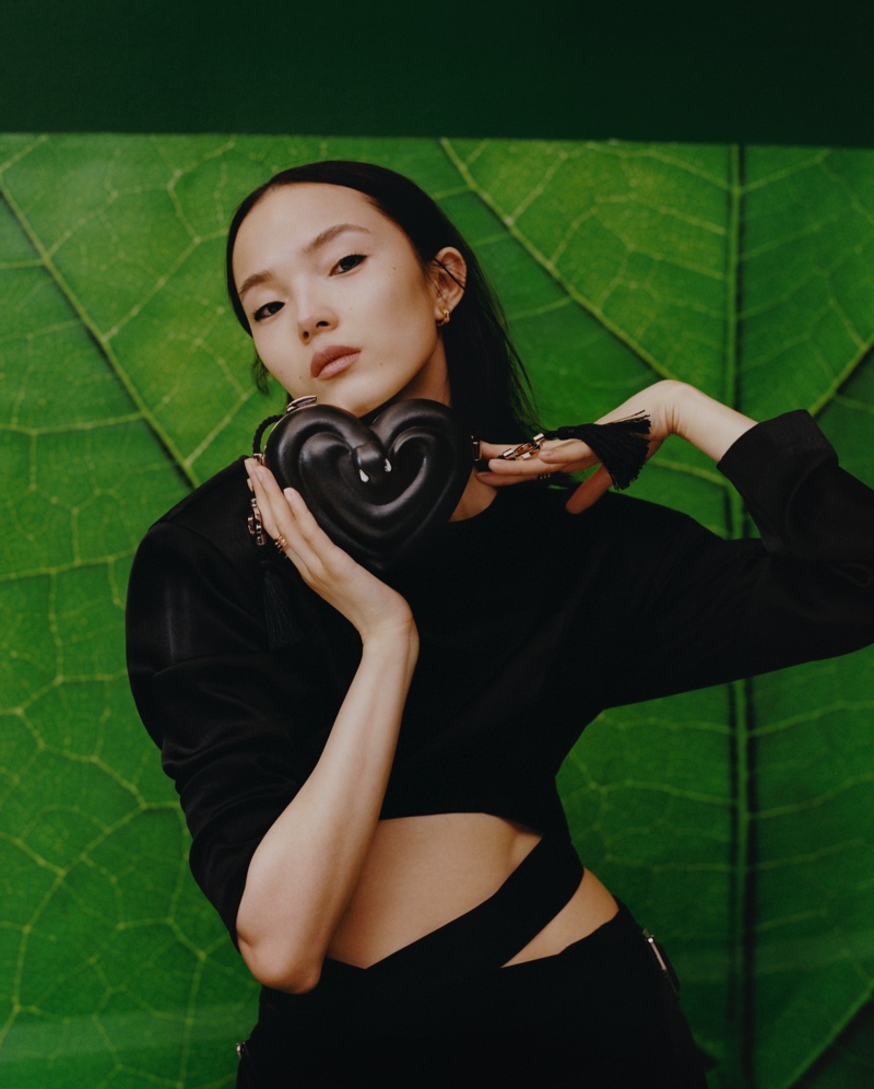 Xiao Wen Ju poses for Bulgari x Ambush accessories campaign.