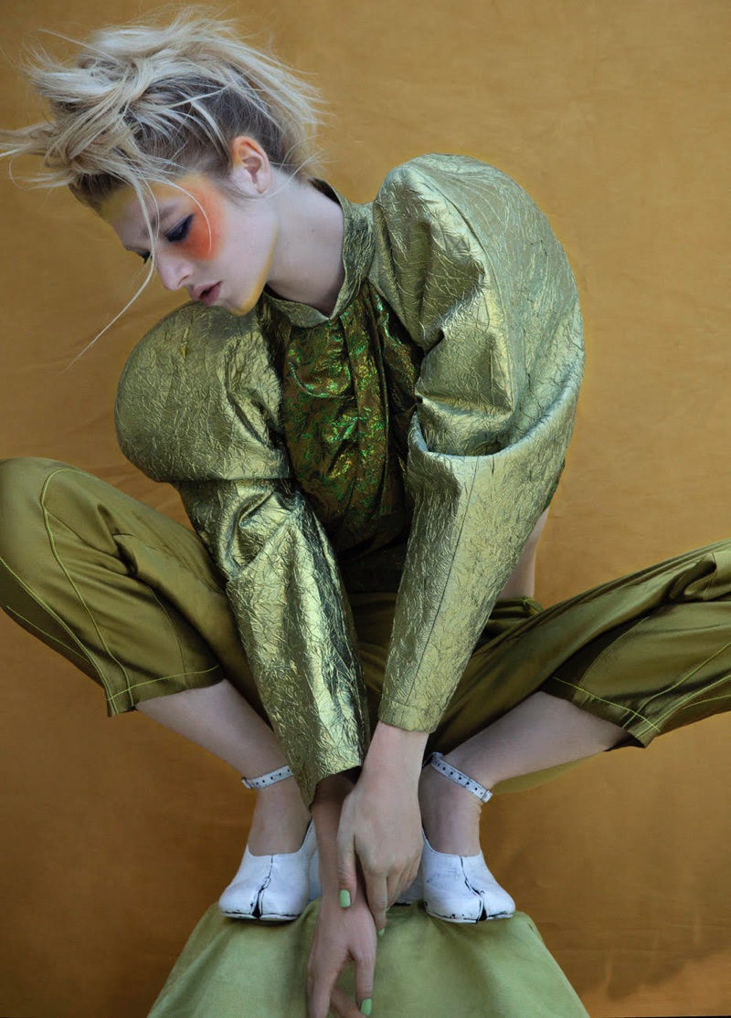 Hunter Schafer poses in John Rogers top and pants.