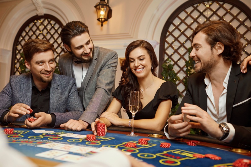 Smiling Group People Casino Table
