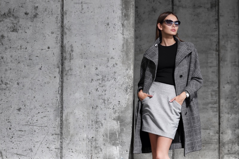black top and grey skirt