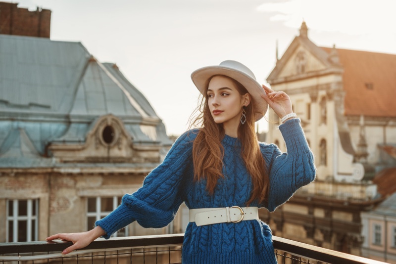 Stylish Woman Blue Sweater White Belt Hat