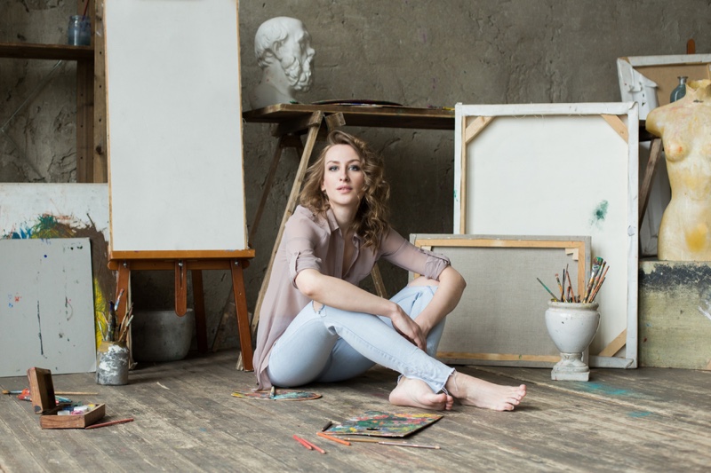 Woman Artist Sitting Paintings Studio