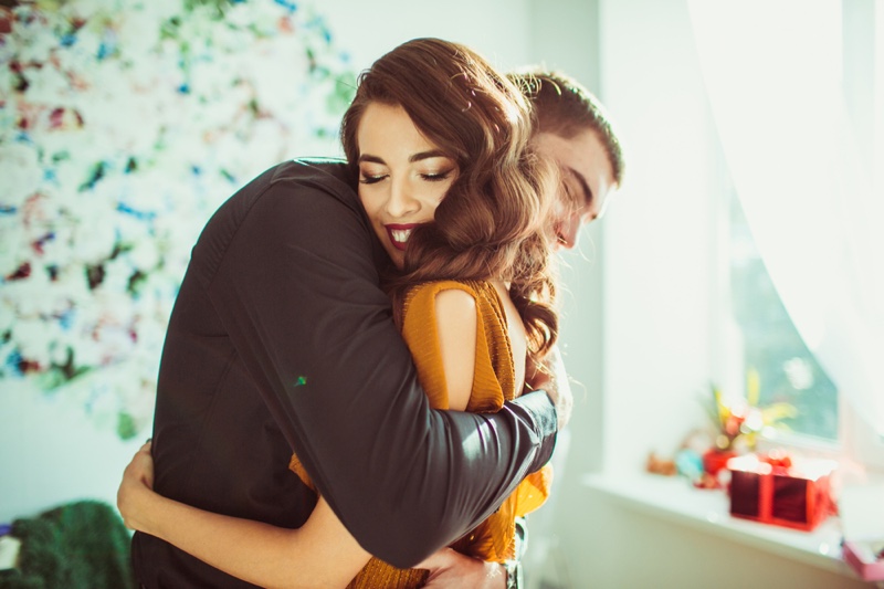 Woman Hugging Man Gifts Couple Happy