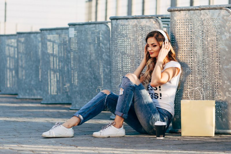 Woman Listening to Music in T-Shirt