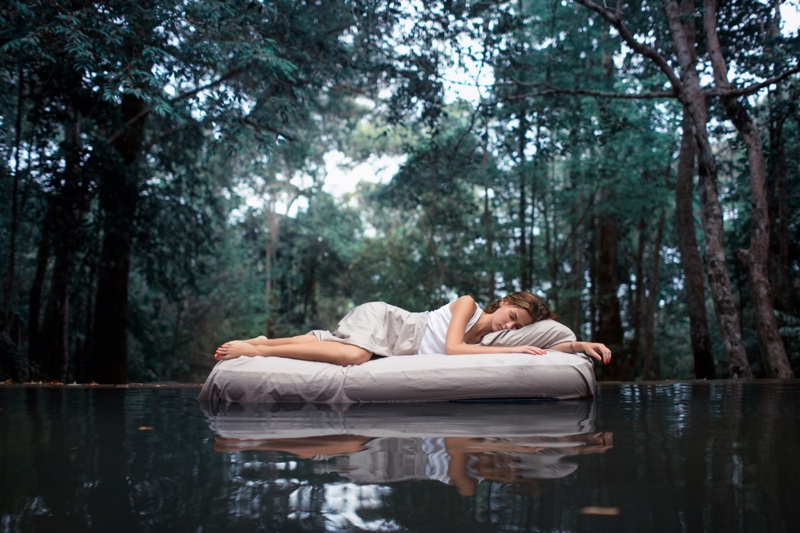 Woman Sleeping Mattress Outside Forest Concept