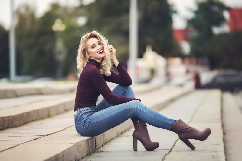 Woman Smiling in Jeans
