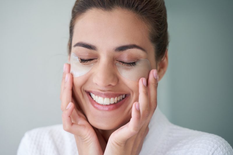 Woman Wearing Face Treatment Smiling