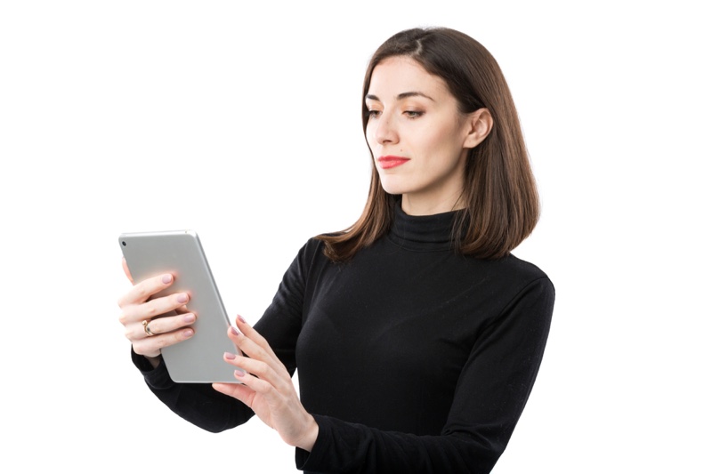 Attractive Woman Looking Tablet Black Turtleneck