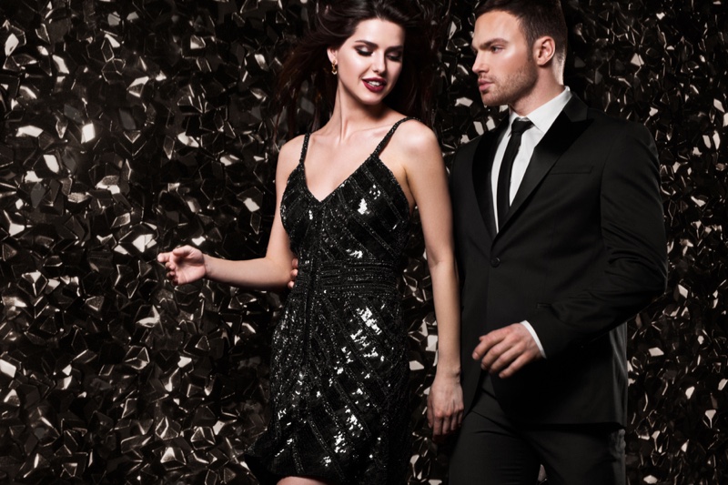 Glamorous Couple Woman Sequin Dress Man Suit Shiny Background