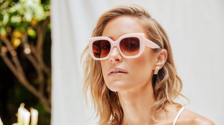 Looking pretty in pink, Kristin Cavallari wears Uncommon James x DIFF Eyewear collaboration.