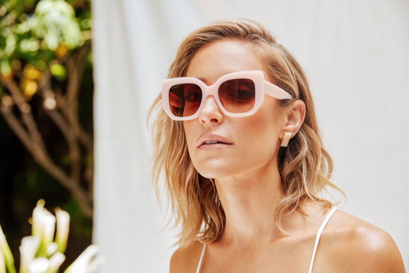 Looking pretty in pink, Kristin Cavallari wears Uncommon James x DIFF Eyewear collaboration.