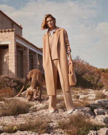 Malgosia Bela Shows Off Mango's Neutral Outfits Malgosia Bela embraces neutral fall style from Mango.
