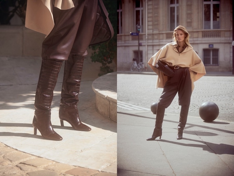 Edita Vilkeviciute wears Massimo Dutti cape with half-zip neck, leather shirt, Limited Edition leather trousers, and leather boots.