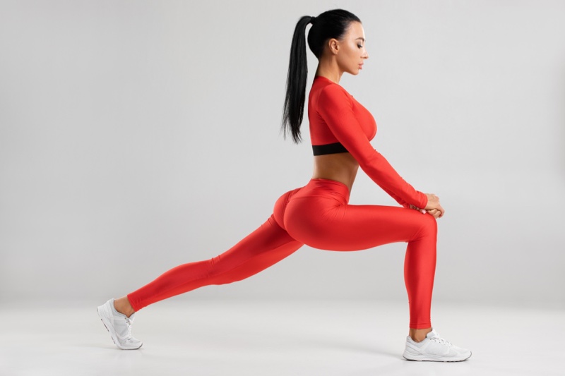 Model Red Top Leggings Lunging Fitness