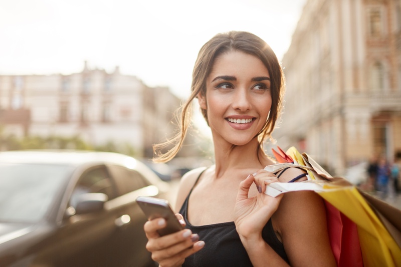 Smiling Attractive Woman Phone Shopping Bags Street