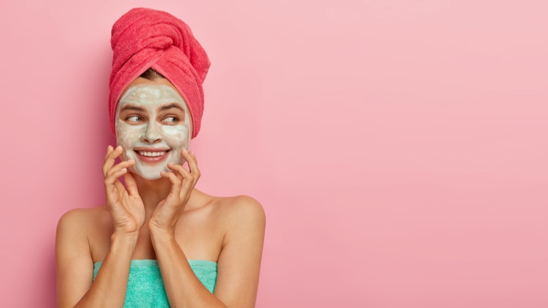 Smiling Woman Green Face Mask Towels Beauty