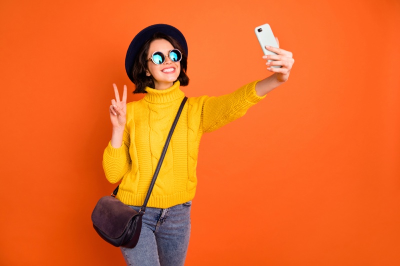 Smiling Woman Phone Selfie Yellow Sweater Fashion Influencer