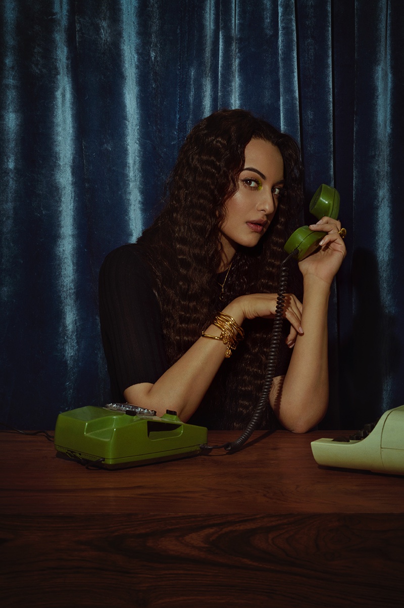 Posing with a retro phone, Sonakshi Sinha makes a call.