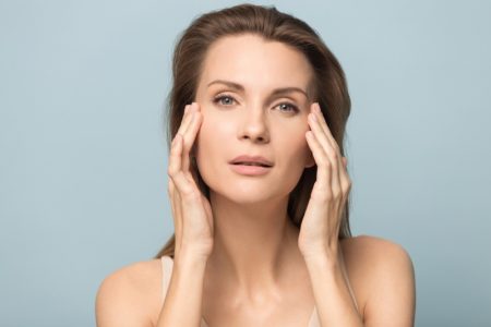 How to Get a Youthful Look With Eyelid Tapes Woman Touching Eyes Model 30s Beauty Skin