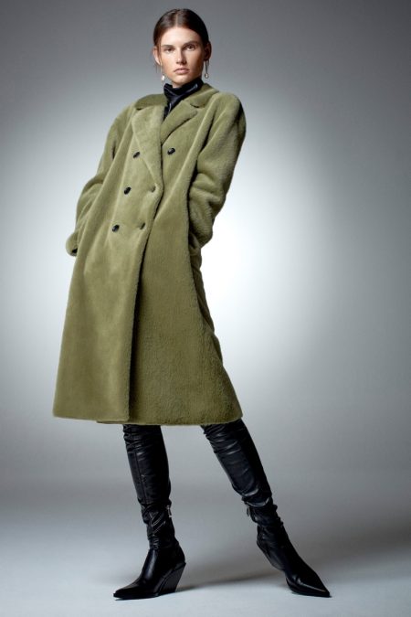 Giedre Dukauskaite Layers Up in Zara's Fall Coats Giedre Dukauskaite poses in Zara faux fur wrap coat.