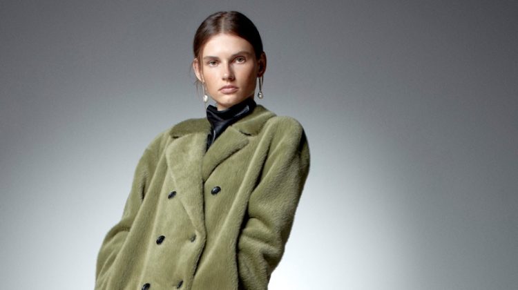 Giedre Dukauskaite poses in Zara faux fur wrap coat.