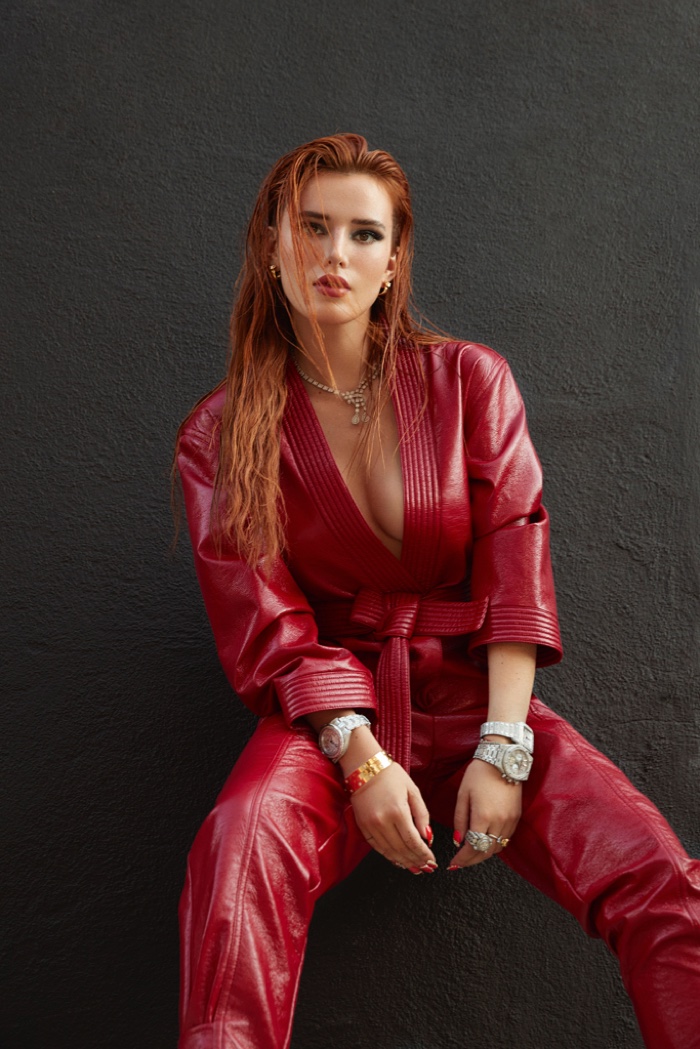 Dressed in red, Bella Thorne wears a leather look.