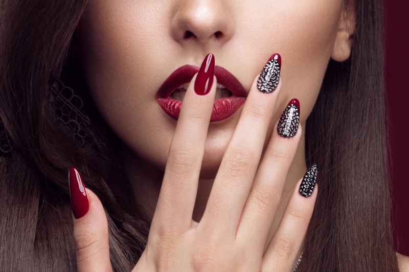 Closeup Woman Nails Dark Red Metallic Beauty