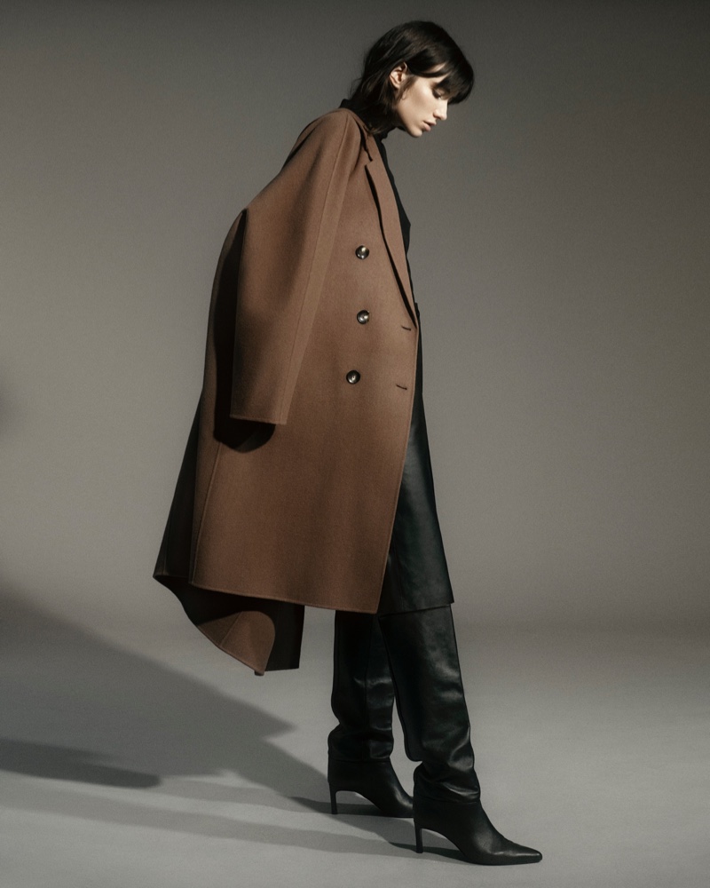 Massimo Dutti Artisanal Wool Coat with Inner Waistcoat, Wool/Silk Turtleneck Sweater, Leather Bermuda Shorts, and High-Heel Boots.