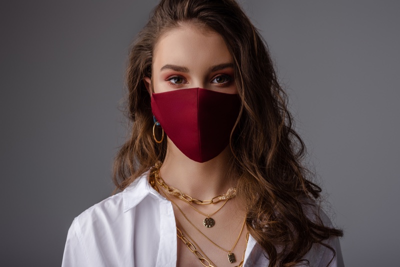 Model Wearing Mask Jewelry Layered Necklaces Wavy Long Hair