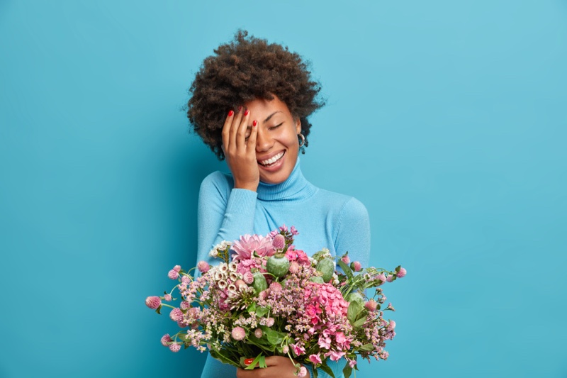 Smiling Afro Model Holding Bouquet Flowers Gift