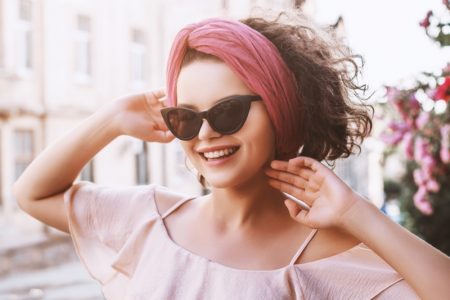 How to Wear a Headband to Look Stylish Smiling Model Cat Eye Sunglasses Pink Headband