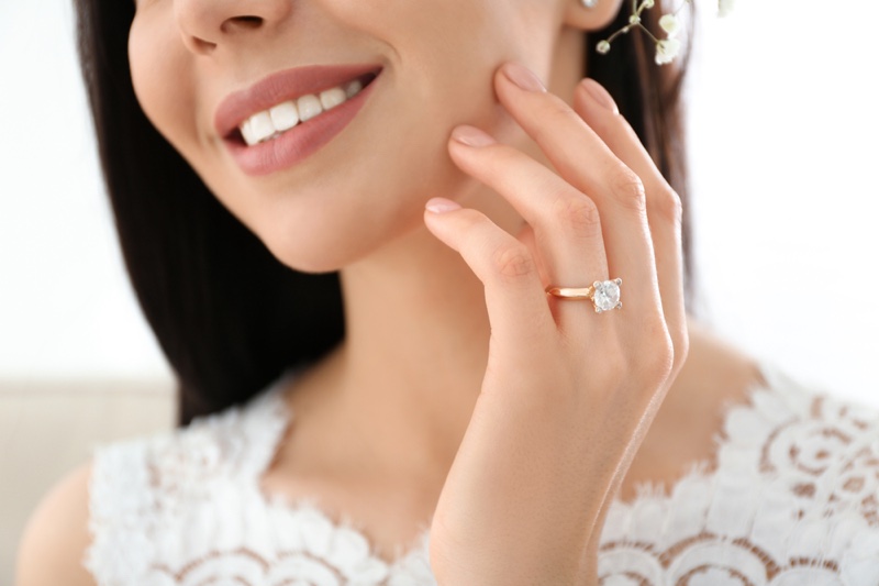 Smiling Woman Diamond Ring Gold Band