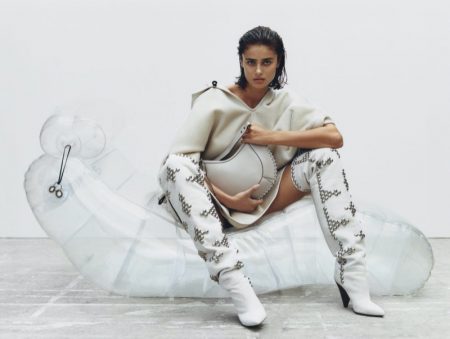 Taylor Hill Rocks Isabel Marant Fall 2020 Accessories Model Taylor Hill wears Isabel Marant Naoko bag with Lyork boots.