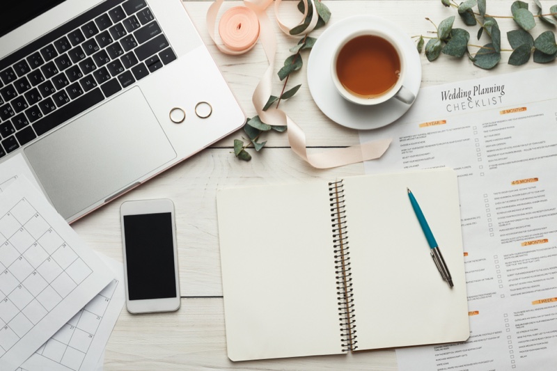 Wedding Planning Checklist Laptop Rings Tea Cup Phone Notebook