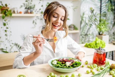 7 Simple Tips for a Healthier Diet Woman Eating Salad