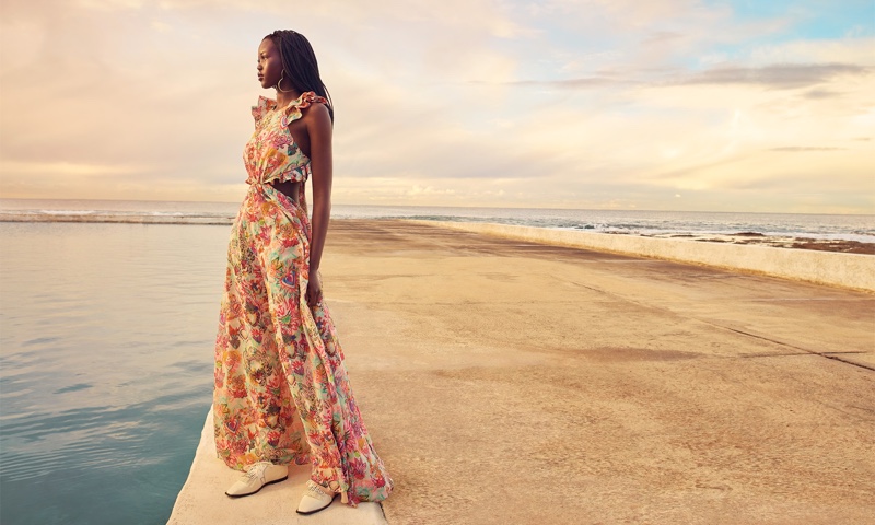 Adut Akech wears Zimmermann The Lovestruck ruffle maxi dress in flaming hearts.