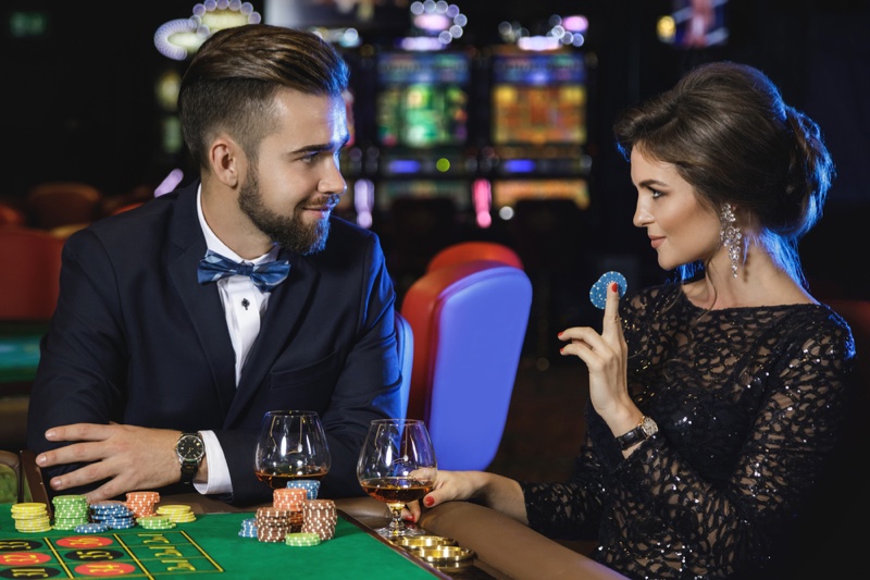 Couple Casino Well Dressed Table Chips Drinks