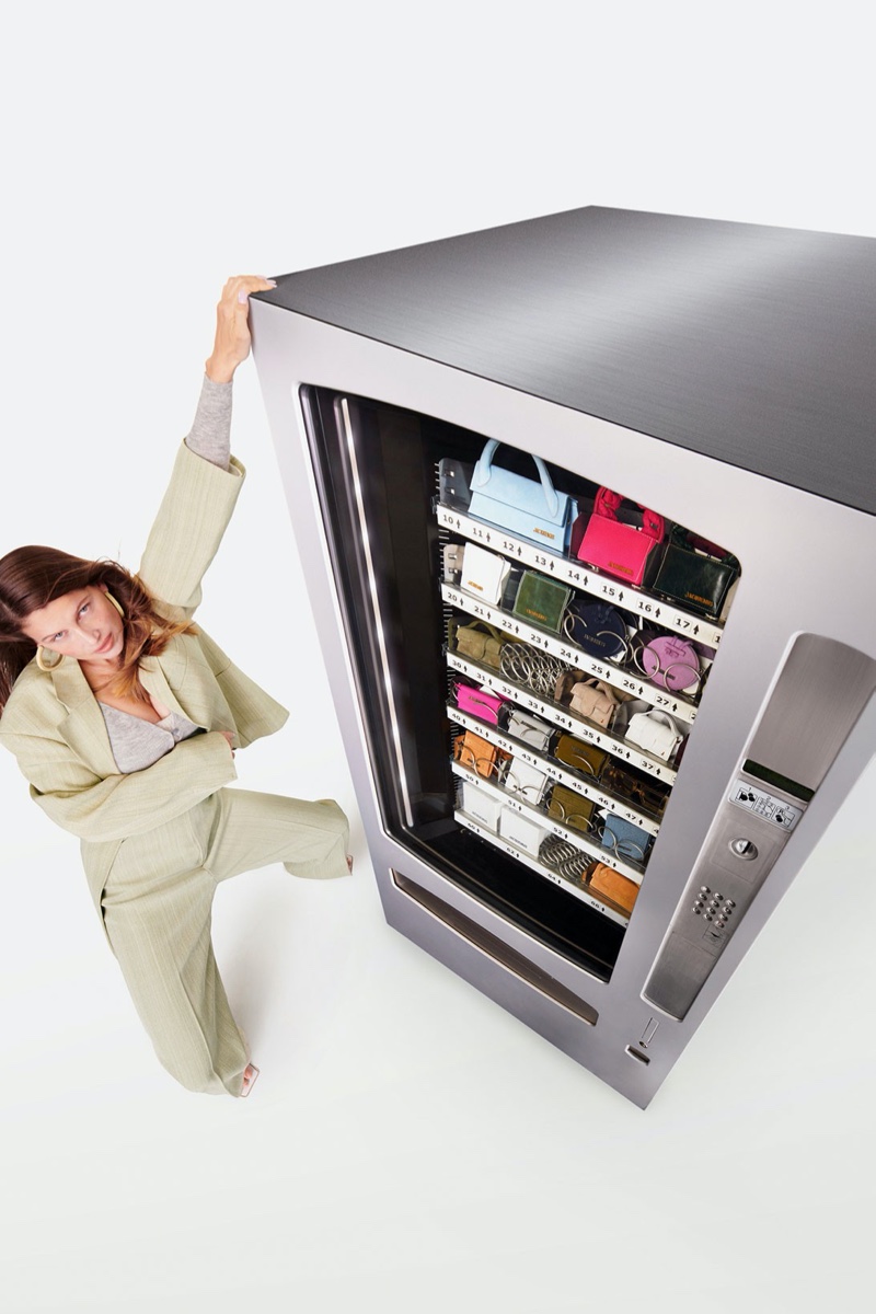 Posing with a vending machine, Laetitia Casta fronts Jacquemus fall-winter 2020 campaign.