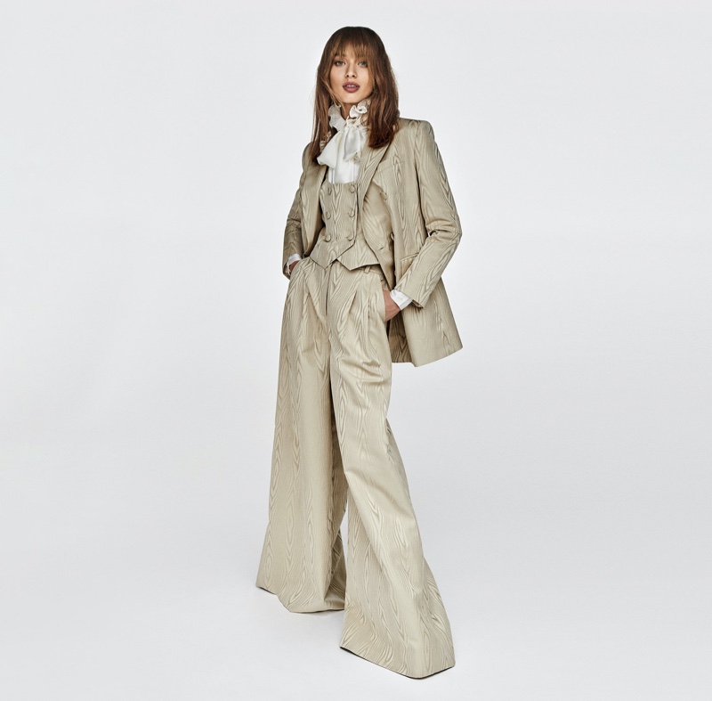 Suiting up, Giulia Maenza appears in Luisa Spagnoli fall-winter 2020 campaign.