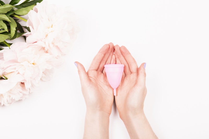 Menstrual Cup Woman's Hands Flowers