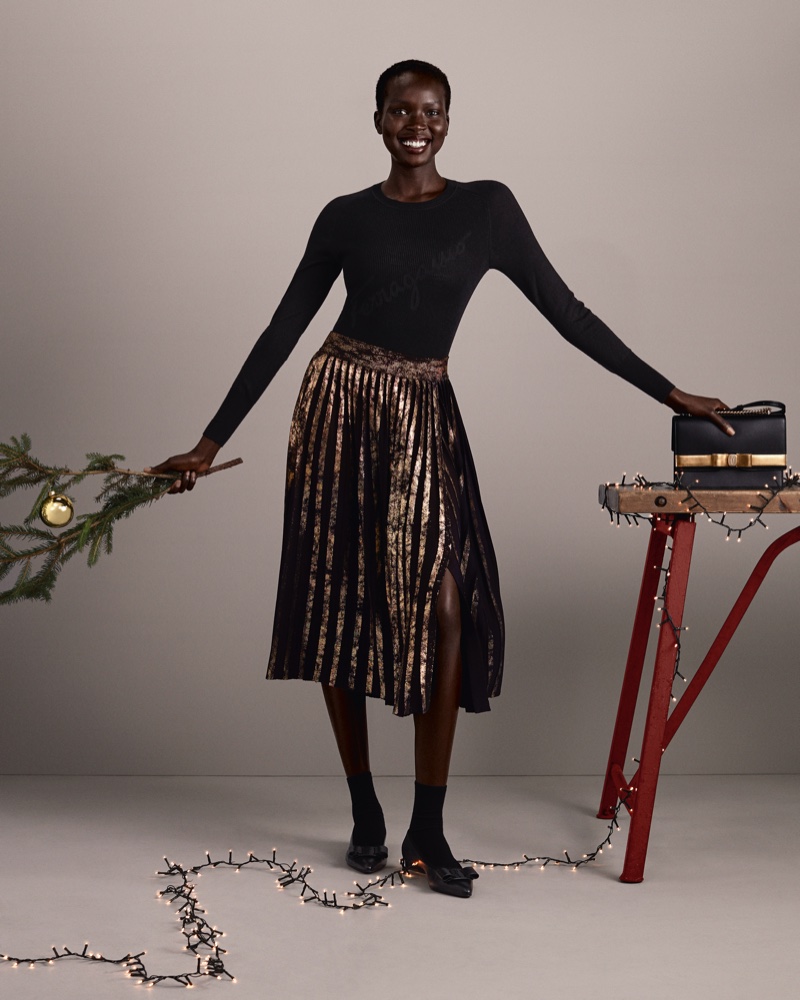 Ajok Madel appears in Salvatore Ferragamo Holiday 2020 campaign.