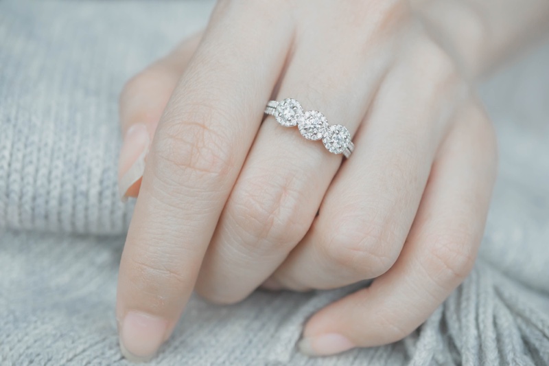 Three Stone Engagement Ring Model's Hand