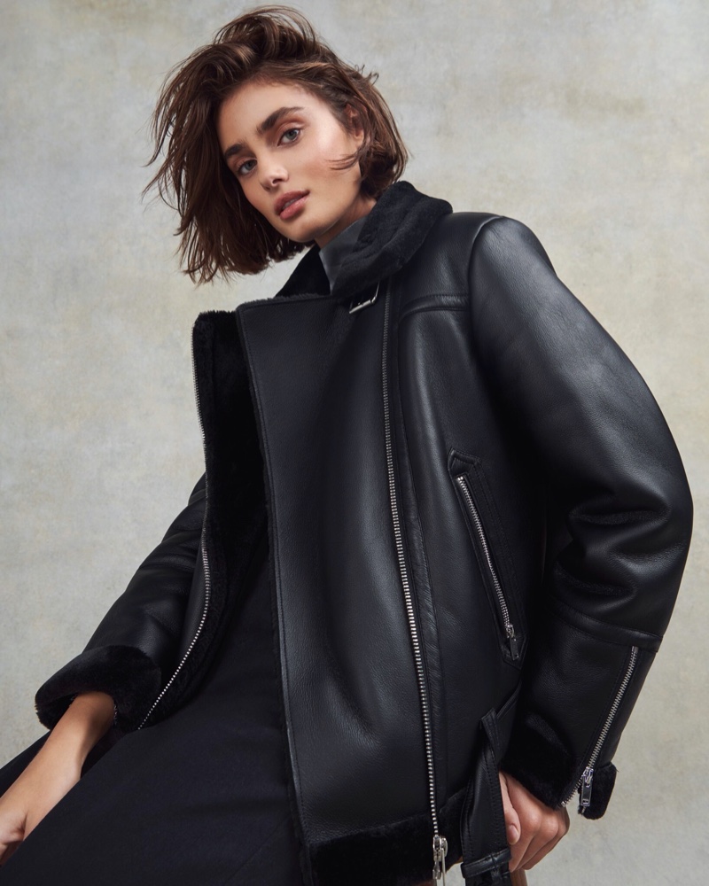 Model Taylor Hill wears a leather jacket in Topshop Christmas 2020 campaign.