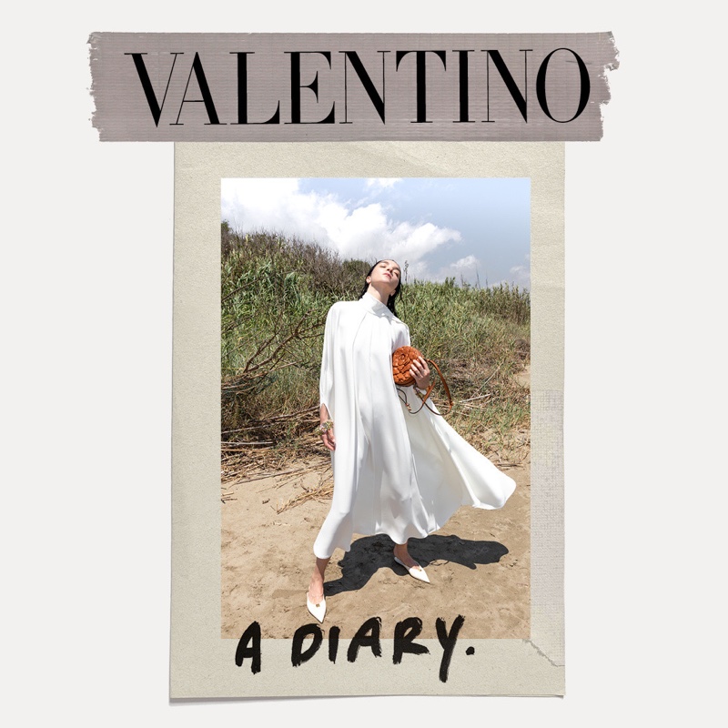 Model Mariacarla Boscono wears white dress in Valentino resort 2021 campaign.