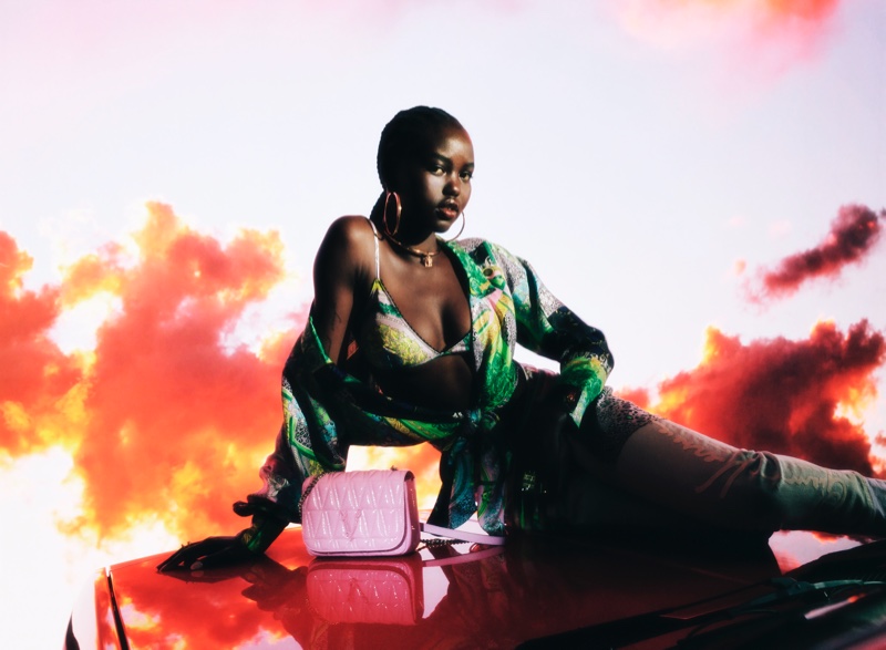 Adut Akech appears in Versace Holiday 2020 campaign.