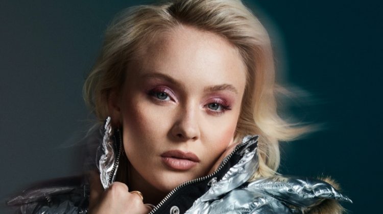 Zara Larsson poses in silver bomber jacket from Superdry fall-winter 2020 collection.
