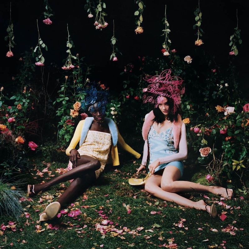 Sokhna Niane and Mariacarla Boscono pose in a garden for Blumarine spring-summer 2021 campaign.